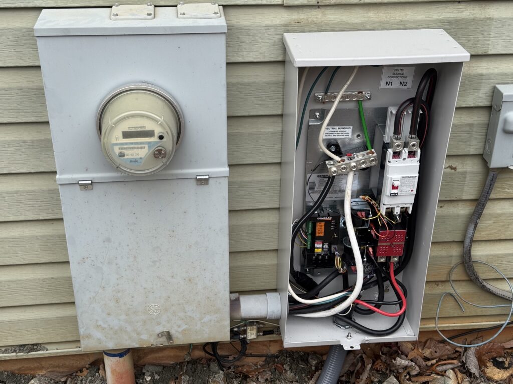 200A Generac automatic transfer switch and utility meter installed by Sunset Electric